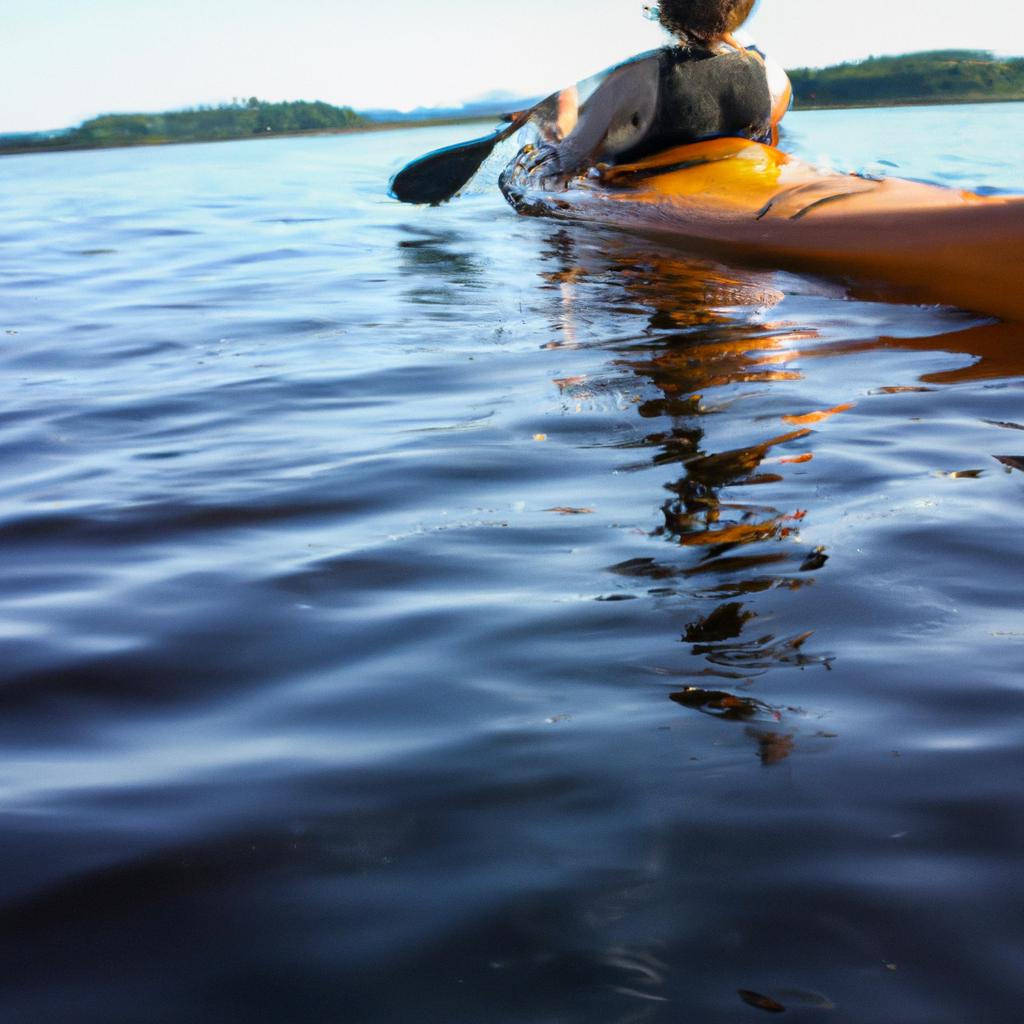 Person kayaking in calm water